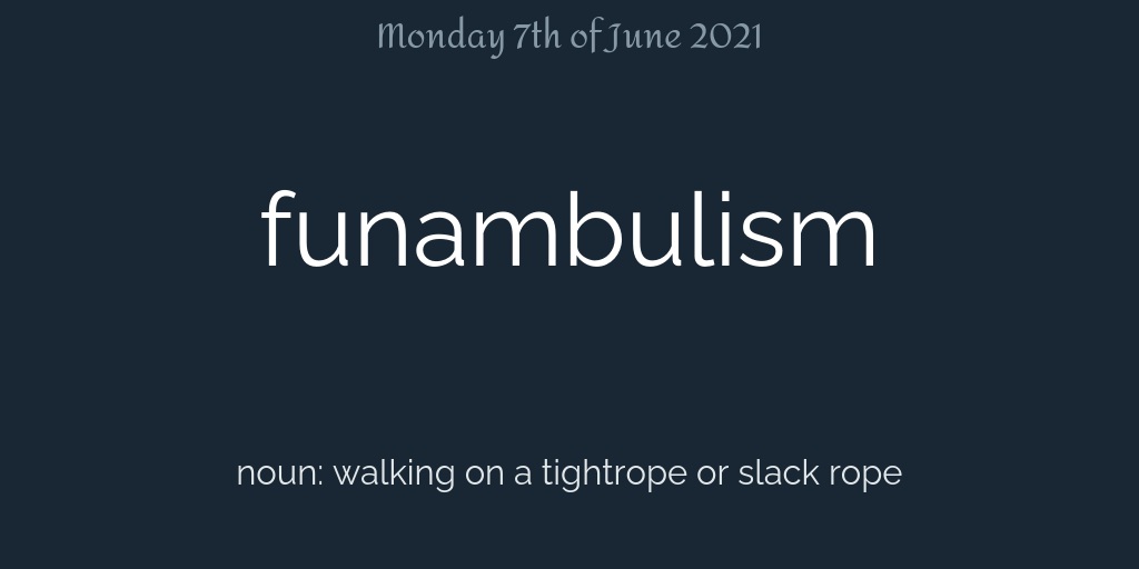 The word funambulism with its definition on a dark background.