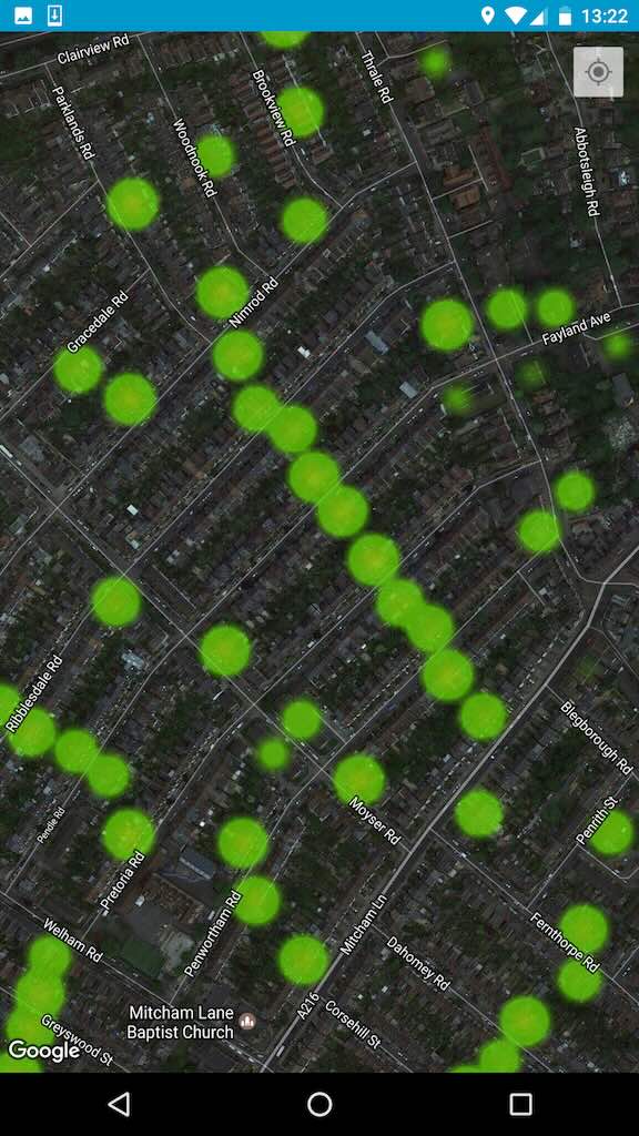 Aerial view of streets with green dots to show price heat